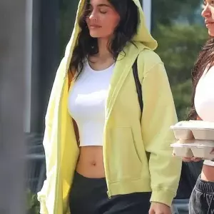 Kylie Jenner wearing Khy Fleece Straight Leg Pant Khy Cropped Raw Hem Rib Tank Salomon Xt Slate Sneakers and Khy Fleece Oversized Zip Hoodie 3