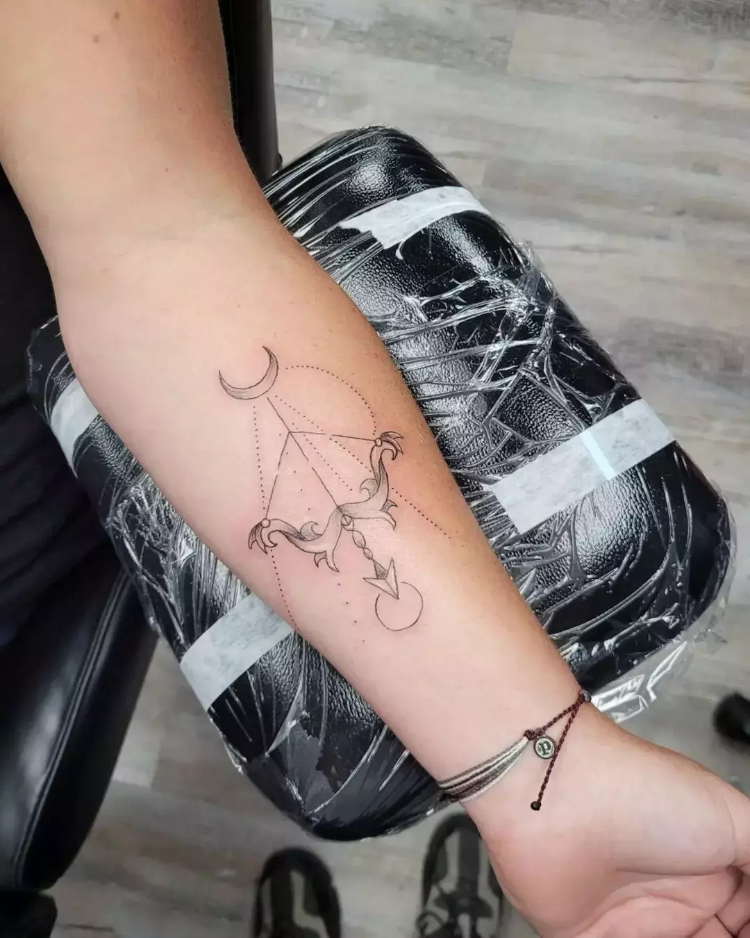 This Bow And Moon Sagittarius Tattoo